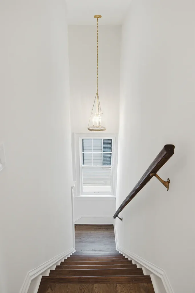 A cute chandelier was added in the stairwell.